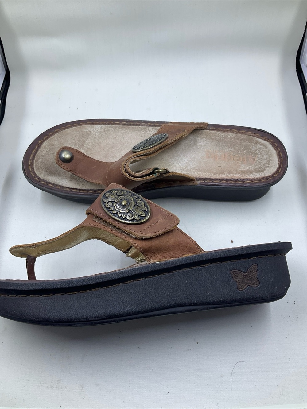 Alegria Brown Leather Platform Thong Sandals with Decorative Medallions